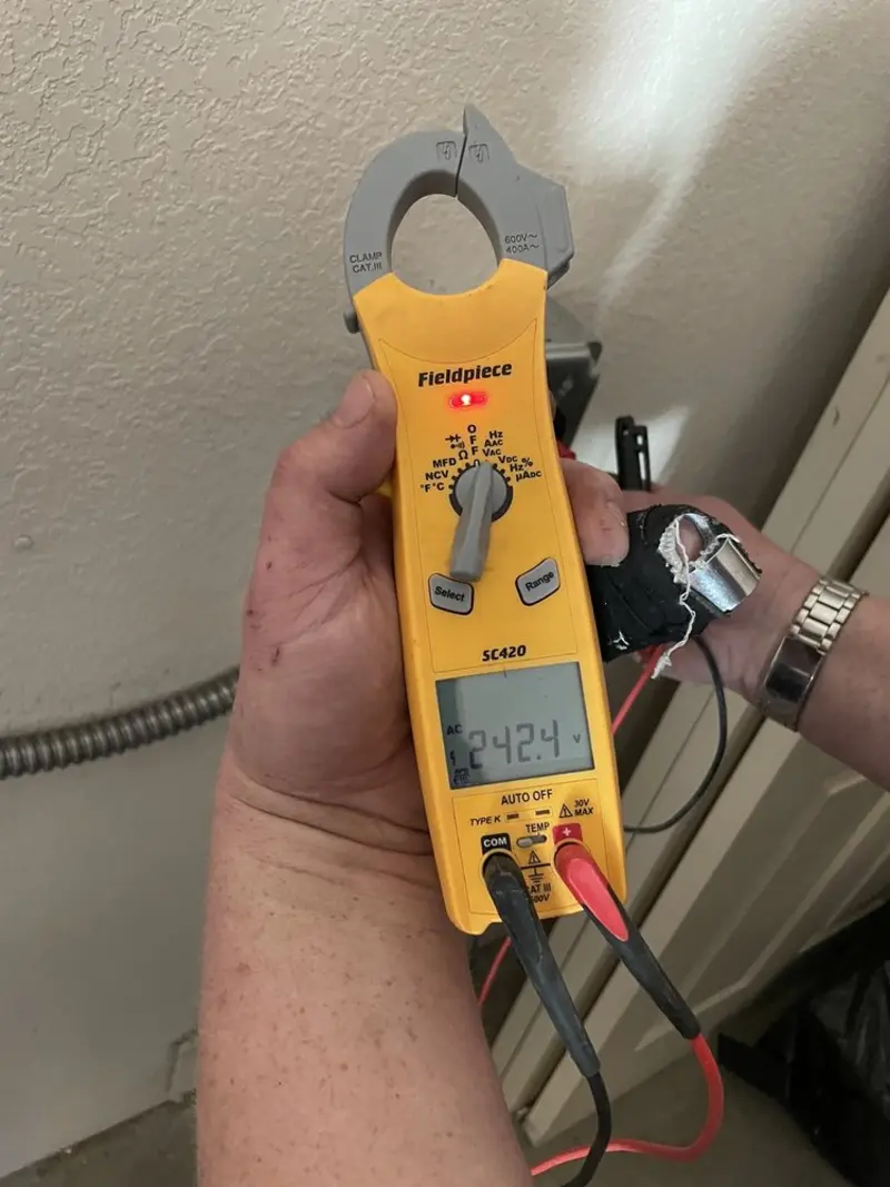 Voltage testing with clamp meter during Electrical Installation Services in Bluffton